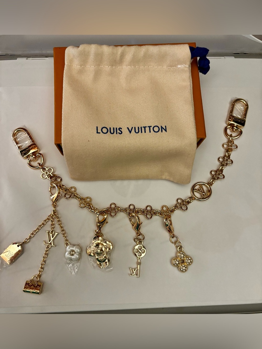 Brand New ! Gold-Tone bag Charm with box